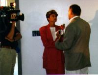 John being interviewed by TV reporter